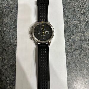 Nixon Black and Silver Watch with Yellow Accents